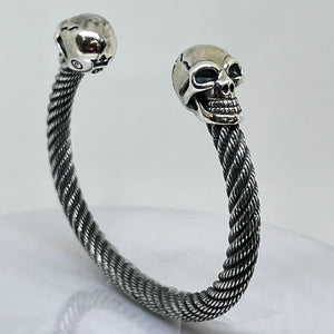 Heavy Sterling Silver Skull Bangle with a twisted design