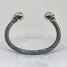 Load image into Gallery viewer, Heavy Sterling Silver Skull Bangle with a twisted design